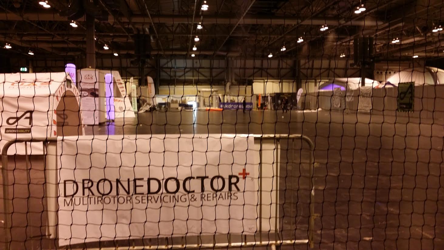 Drone Doctor banner in the main flying arena at the UK Drone Show 2015 NEC Birmingham